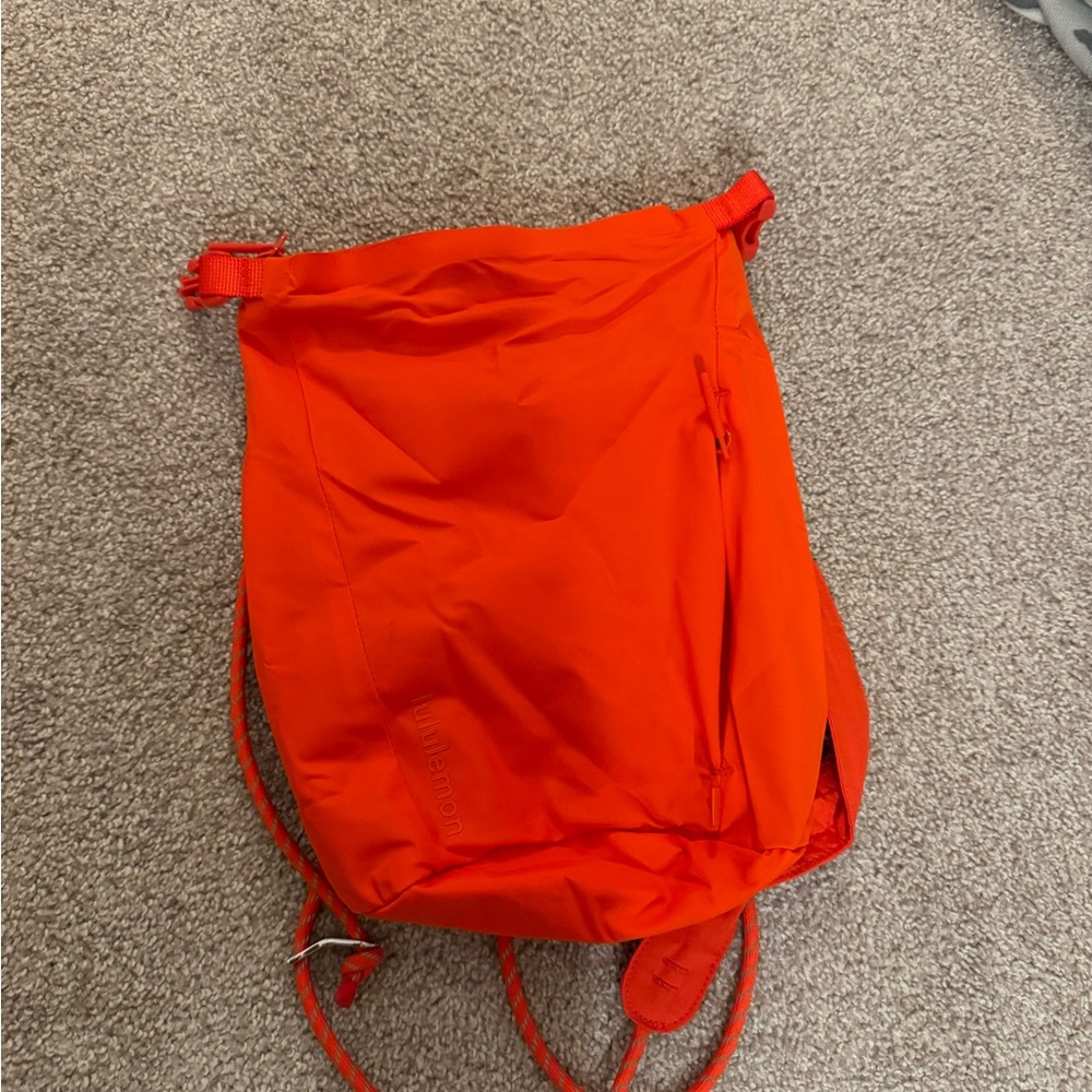 Lululemon mini orange waterproof backpack bag